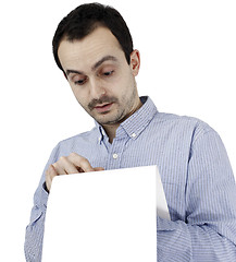 Image showing Man holding a paper