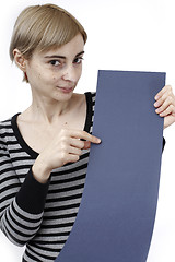 Image showing Woman holding a paper