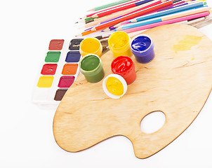 Image showing Palette of the artist, paint, pencils