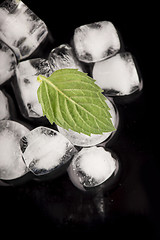 Image showing Ice cubes isolated on black