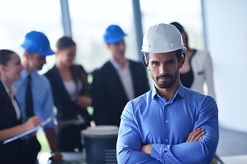 Image showing business people and engineers on meeting