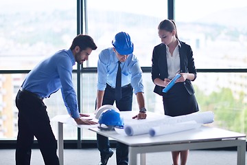 Image showing business people and engineers on meeting