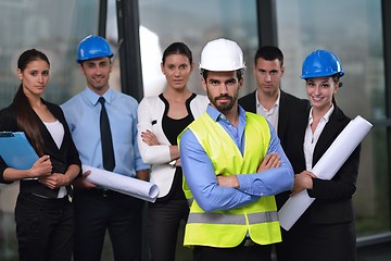 Image showing business people and engineers on meeting