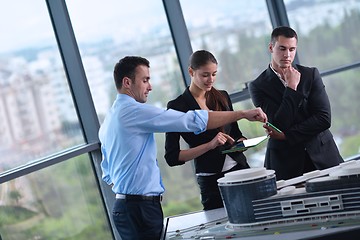 Image showing business people and engineers on meeting