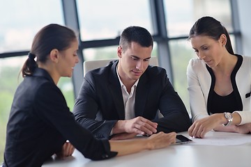 Image showing business people in a meeting at office