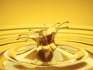 Image showing Splash of melted gold with droplets and waves