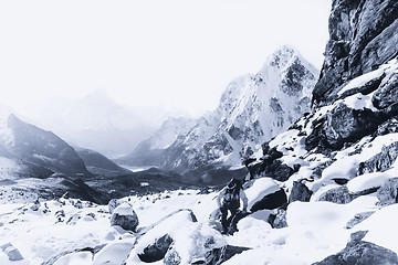 Image showing Climber and Cho La pass at daybreak in Himalayas