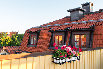 Image showing Balcony decorated with geraniums