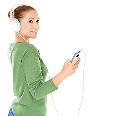 Image showing Attractive woman listening to music