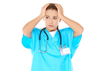 Image showing Young beautiful doctor is worried