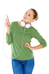 Image showing Young woman enjoying her music