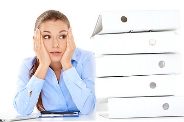 Image showing Overworked stressed businesswoman