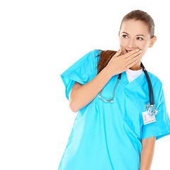 Image showing Pretty young nurse trying to hide her amusement