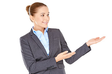 Image showing Woman pointing to the side with her hands