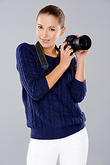 Image showing Beautiful female photographer