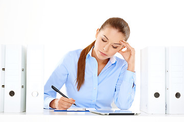 Image showing Efficient businesswoman working at her desk