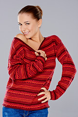 Image showing Sexy woman in a red winter top