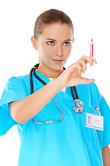 Image showing Female doctor preparing an injection