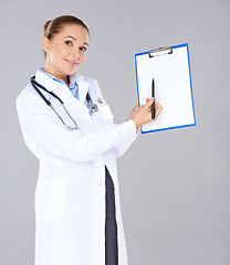 Image showing Female doctor or nurse with a clipboard