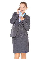 Image showing Businesswoman chatting on her mobile phone