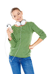 Image showing Woman choosing her downloaded music