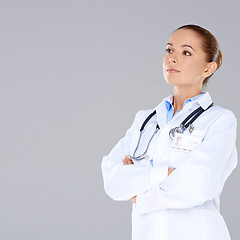 Image showing Confident female doctor with crossed arms