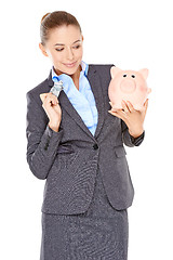 Image showing Woman deciding whether to spend or save