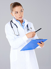 Image showing Woman doctor with a clipboard