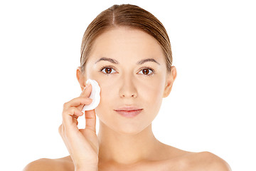 Image showing Beautiful woman cleaning her face