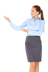 Image showing Businesswoman pointing to the left