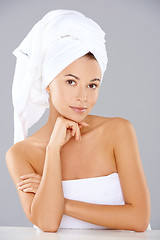 Image showing Beautiful serene woman wearing white towels