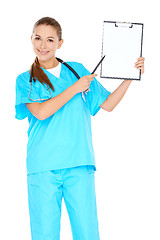 Image showing Smiling doctor with a blank clipboard