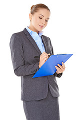 Image showing Businesswoman writing notes on a clipboard