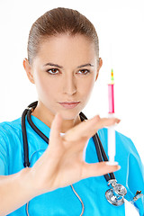 Image showing Female doctor preparing an injection