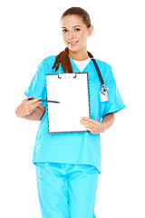 Image showing Smiling doctor with a blank clipboard