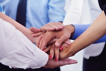 Image showing business people group joining hands