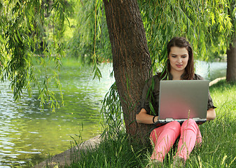 Image showing Young Woman Studying Outside