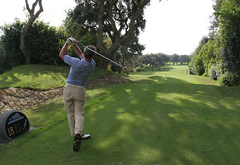 Image showing man golf swing in valderrama, spain