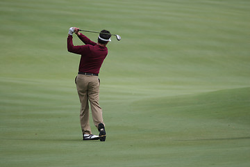 Image showing man golf swing in valderrama, spain