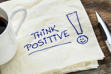 Image showing think positive on a napkin