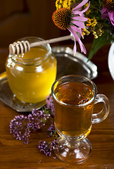 Image showing Still life from medicinal herbs, honey, herbal tea