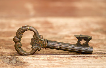 Image showing Retro key on wooden table