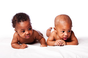 Image showing Two adorable babies laying together