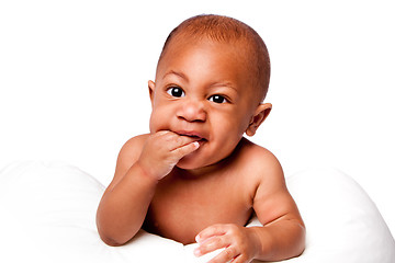 Image showing Teething baby biting fingers