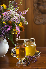 Image showing Still life from medicinal herbs, honey, herbal tea