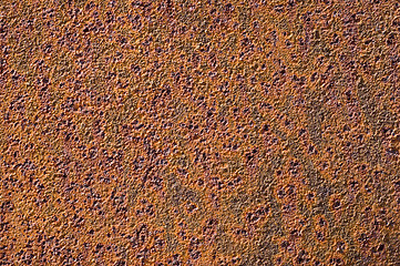 Image showing brown rusty surface with bulges