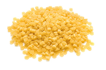 Image showing heap of raw pasta on the white background