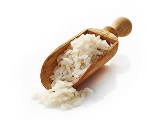 Image showing wooden scoop with white rice