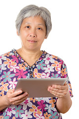 Image showing Asian elderly with digital tablet