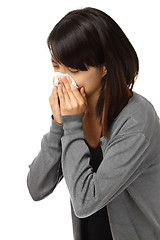 Image showing Cold sneezing asian woman
